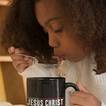 Load image into Gallery viewer, Powered by Jesus Christ - Black Mug 15oz
